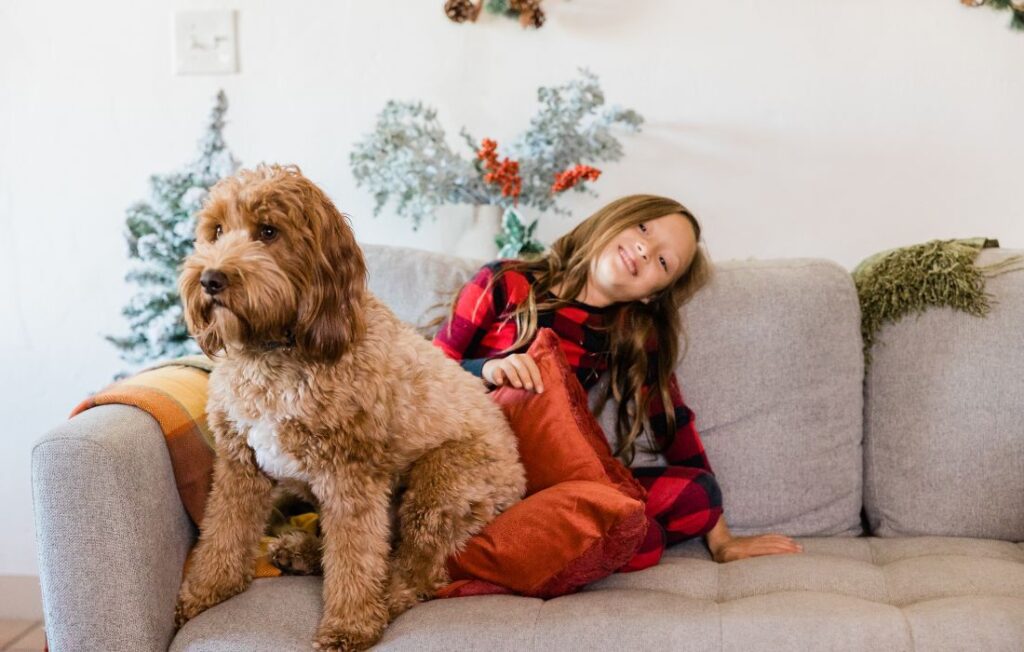 Girl and Dog on the Couch 