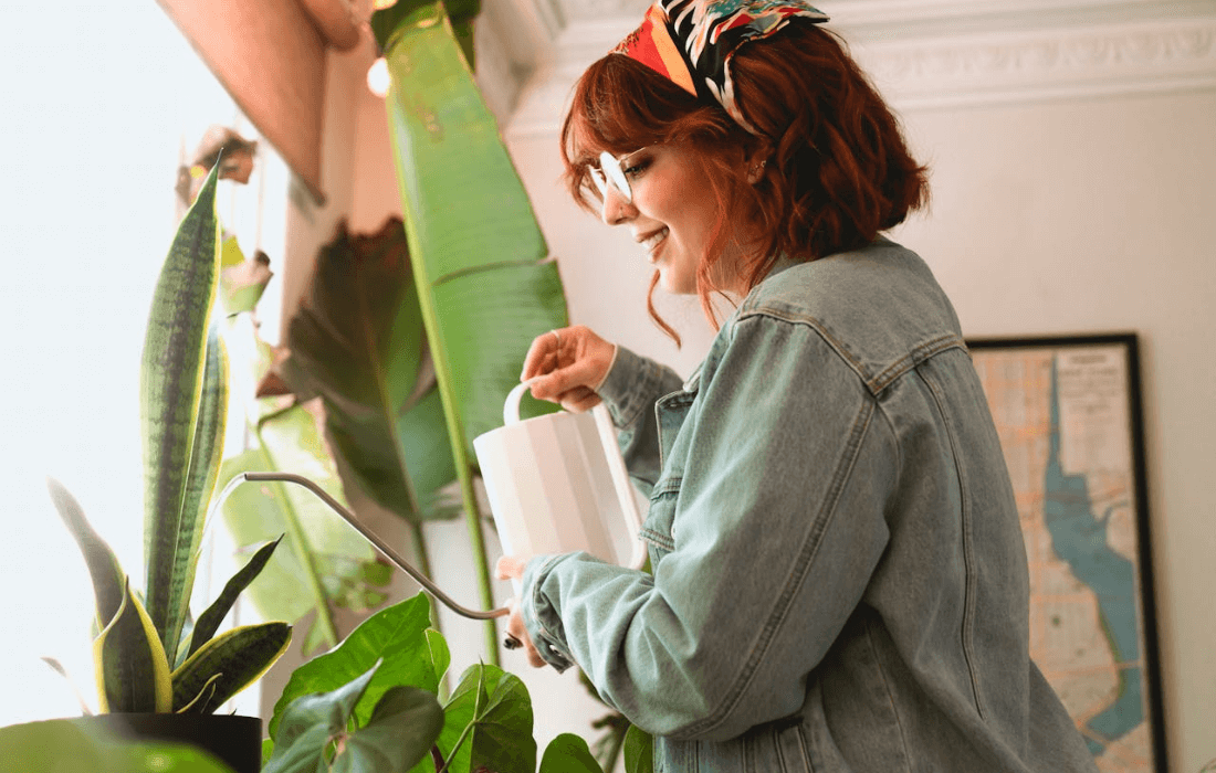 woman taking care of plants