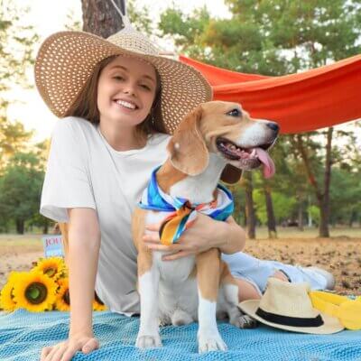 dog mom with Beagle Dog on Picnic in Forest