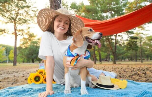 dog mom with Beagle Dog on Picnic in Forest