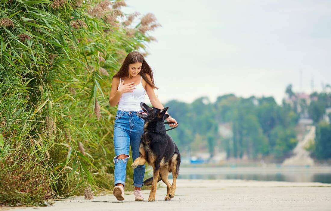 dog mom walking with her pup