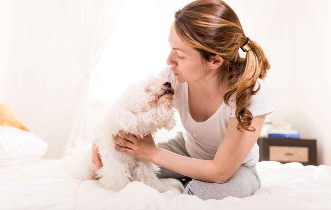 Woman with dog in the morning