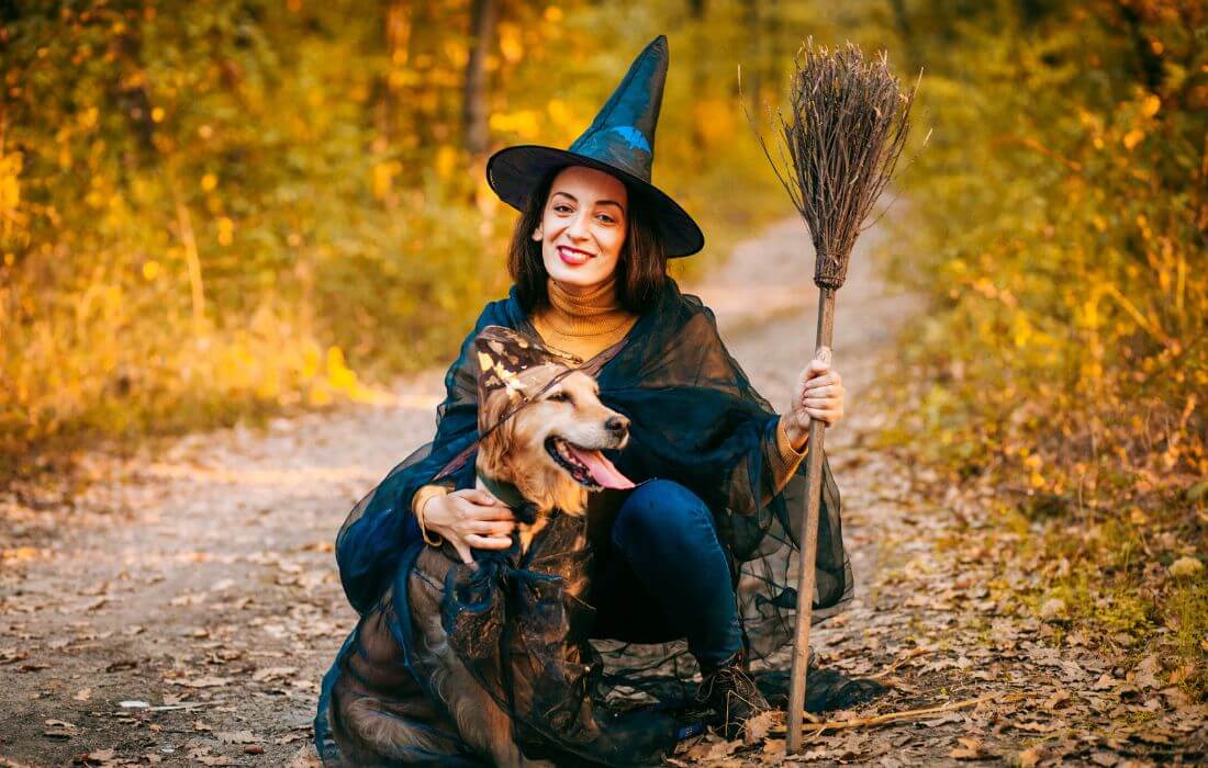 woman with dog dressed for halloween